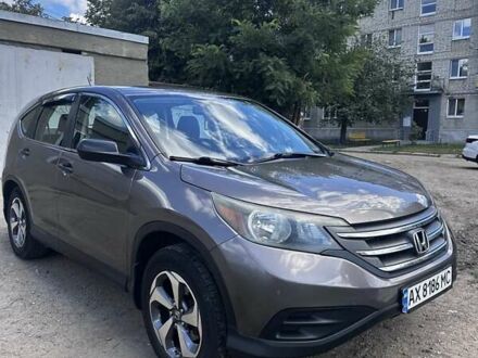 Коричневый Хонда СРВ, объемом двигателя 2.35 л и пробегом 210 тыс. км за 12400 $, фото 1 на Automoto.ua