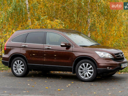 Коричневый Хонда СРВ, объемом двигателя 2.35 л и пробегом 132 тыс. км за 15000 $, фото 1 на Automoto.ua