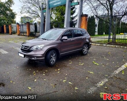 Коричневый Хонда СРВ, объемом двигателя 2.4 л и пробегом 250 тыс. км за 14000 $, фото 1 на Automoto.ua