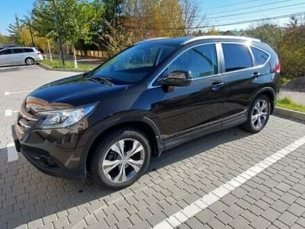 Коричневый Хонда СРВ, объемом двигателя 2.35 л и пробегом 164 тыс. км за 17600 $, фото 1 на Automoto.ua