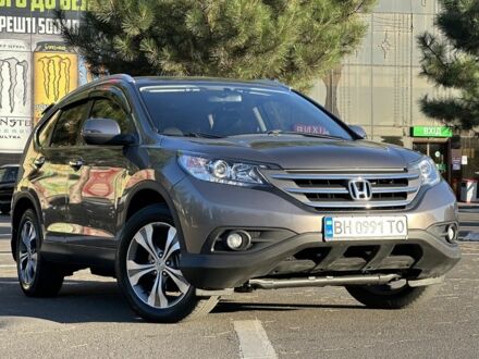 Коричневый Хонда СРВ, объемом двигателя 0.24 л и пробегом 141 тыс. км за 14300 $, фото 1 на Automoto.ua