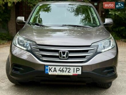 Коричневый Хонда СРВ, объемом двигателя 2.35 л и пробегом 216 тыс. км за 15700 $, фото 1 на Automoto.ua