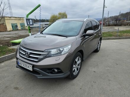 Коричневий Хонда СРВ, об'ємом двигуна 2.2 л та пробігом 204 тис. км за 17600 $, фото 1 на Automoto.ua