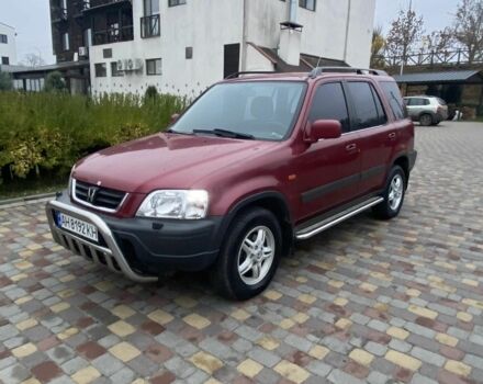 Красный Хонда СРВ, объемом двигателя 2 л и пробегом 217 тыс. км за 5100 $, фото 1 на Automoto.ua