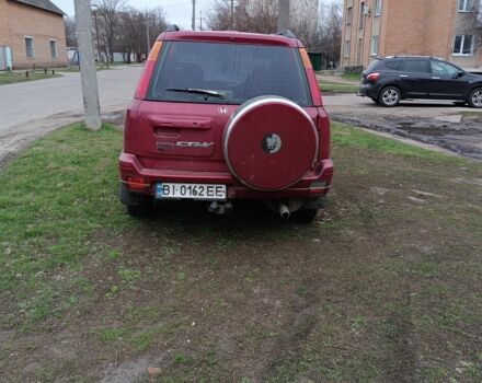 Красный Хонда СРВ, объемом двигателя 2 л и пробегом 300 тыс. км за 3900 $, фото 4 на Automoto.ua