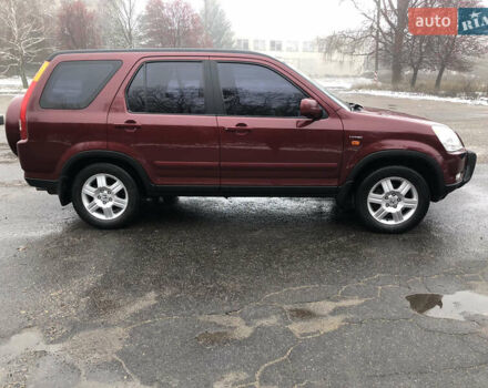 Червоний Хонда СРВ, об'ємом двигуна 2 л та пробігом 183 тис. км за 6500 $, фото 7 на Automoto.ua