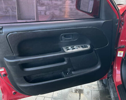 Красный Хонда СРВ, объемом двигателя 2 л и пробегом 408 тыс. км за 6500 $, фото 13 на Automoto.ua