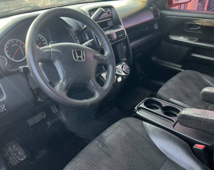 Красный Хонда СРВ, объемом двигателя 2 л и пробегом 408 тыс. км за 6500 $, фото 11 на Automoto.ua