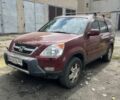 Красный Хонда СРВ, объемом двигателя 2 л и пробегом 280 тыс. км за 7500 $, фото 1 на Automoto.ua
