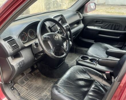 Красный Хонда СРВ, объемом двигателя 2 л и пробегом 280 тыс. км за 7500 $, фото 5 на Automoto.ua