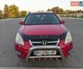 Червоний Хонда СРВ, об'ємом двигуна 2 л та пробігом 282 тис. км за 6800 $, фото 1 на Automoto.ua