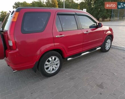 Червоний Хонда СРВ, об'ємом двигуна 2 л та пробігом 282 тис. км за 6800 $, фото 3 на Automoto.ua