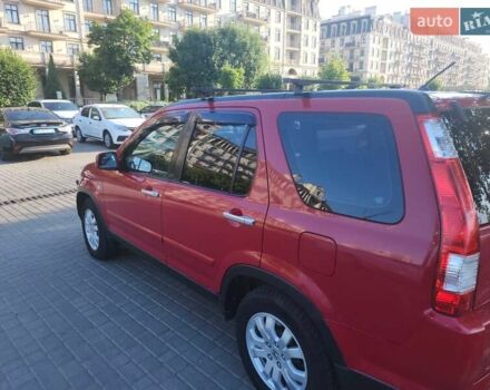 Червоний Хонда СРВ, об'ємом двигуна 2 л та пробігом 225 тис. км за 7450 $, фото 1 на Automoto.ua