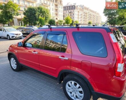 Червоний Хонда СРВ, об'ємом двигуна 2 л та пробігом 225 тис. км за 7450 $, фото 6 на Automoto.ua