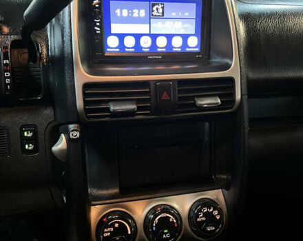 Красный Хонда СРВ, объемом двигателя 2 л и пробегом 257 тыс. км за 7300 $, фото 4 на Automoto.ua