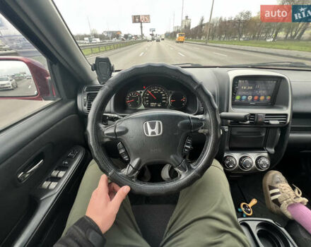 Красный Хонда СРВ, объемом двигателя 2 л и пробегом 257 тыс. км за 7300 $, фото 2 на Automoto.ua