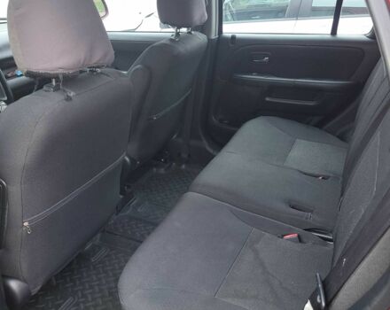 Красный Хонда СРВ, объемом двигателя 2 л и пробегом 257 тыс. км за 6876 $, фото 5 на Automoto.ua