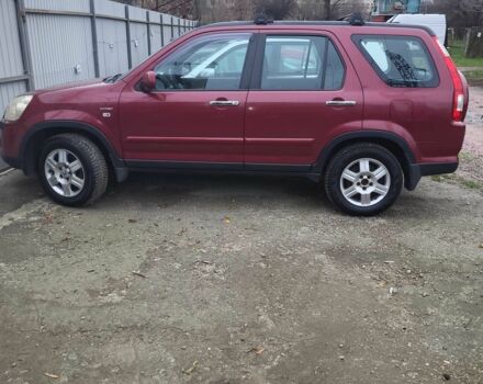 Красный Хонда СРВ, объемом двигателя 2 л и пробегом 257 тыс. км за 6876 $, фото 2 на Automoto.ua