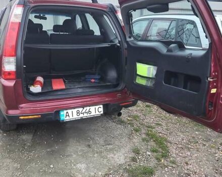 Красный Хонда СРВ, объемом двигателя 2 л и пробегом 257 тыс. км за 6876 $, фото 2 на Automoto.ua