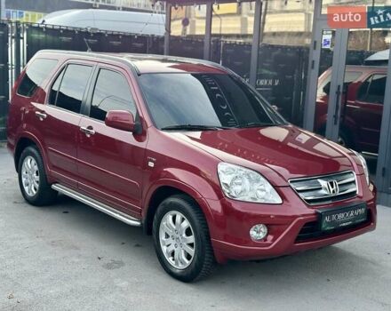 Красный Хонда СРВ, объемом двигателя 2 л и пробегом 321 тыс. км за 7900 $, фото 4 на Automoto.ua