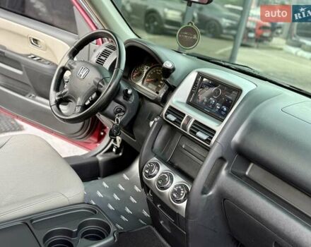 Красный Хонда СРВ, объемом двигателя 2 л и пробегом 321 тыс. км за 7900 $, фото 44 на Automoto.ua