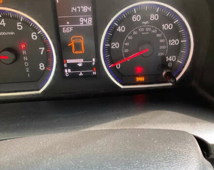 Красный Хонда СРВ, объемом двигателя 2.35 л и пробегом 150 тыс. км за 10000 $, фото 5 на Automoto.ua