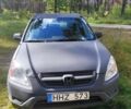 Красный Хонда СРВ, объемом двигателя 2.4 л и пробегом 200 тыс. км за 1850 $, фото 1 на Automoto.ua