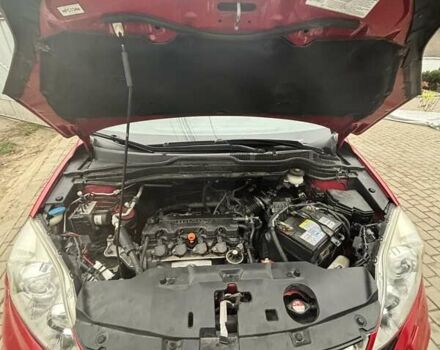 Червоний Хонда СРВ, об'ємом двигуна 2 л та пробігом 220 тис. км за 13200 $, фото 1 на Automoto.ua