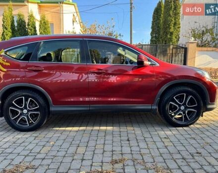 Красный Хонда СРВ, объемом двигателя 2 л и пробегом 153 тыс. км за 14300 $, фото 6 на Automoto.ua