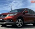 Красный Хонда СРВ, объемом двигателя 2.2 л и пробегом 196 тыс. км за 19000 $, фото 1 на Automoto.ua