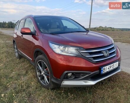 Красный Хонда СРВ, объемом двигателя 2.2 л и пробегом 210 тыс. км за 16800 $, фото 1 на Automoto.ua