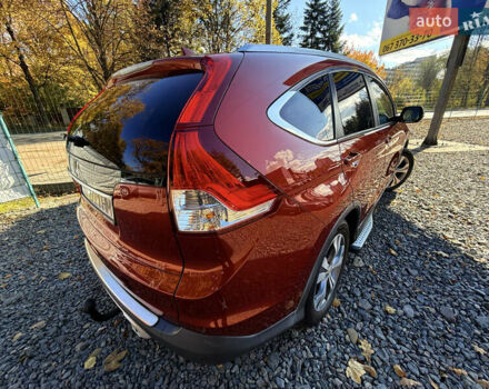 Хонда СРВ 2013 в Трускавце на Automoto.ua Красный Хонда СРВ, объемом двигателя 2.2 л и пробегом 293 тыс. км за 16599 $, фото 17 на Automoto.ua