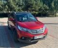 Красный Хонда СРВ, объемом двигателя 2.2 л и пробегом 255 тыс. км за 16250 $, фото 1 на Automoto.ua