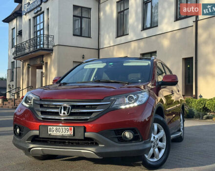 Красный Хонда СРВ, объемом двигателя 2.2 л и пробегом 211 тыс. км за 18599 $, фото 1 на Automoto.ua