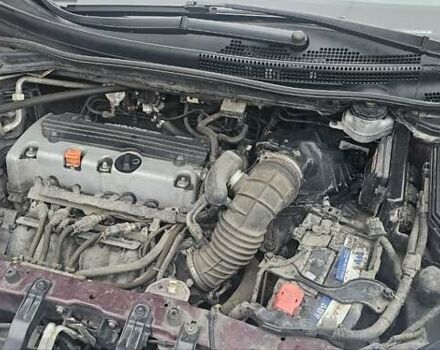 Красный Хонда СРВ, объемом двигателя 2.36 л и пробегом 158 тыс. км за 15600 $, фото 2 на Automoto.ua