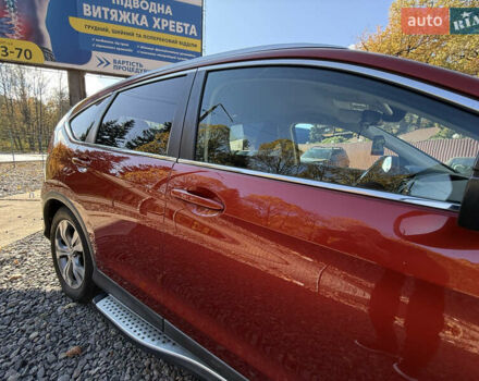 Хонда СРВ 2013 в Трускавце на Automoto.ua Красный Хонда СРВ, объемом двигателя 2.2 л и пробегом 293 тыс. км за 16599 $, фото 6 на Automoto.ua