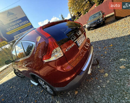 Хонда СРВ 2013 в Трускавце на Automoto.ua Красный Хонда СРВ, объемом двигателя 2.2 л и пробегом 293 тыс. км за 16599 $, фото 24 на Automoto.ua