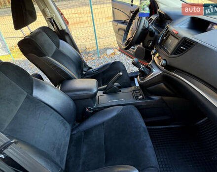 Хонда СРВ 2013 в Трускавце на Automoto.ua Красный Хонда СРВ, объемом двигателя 2.2 л и пробегом 293 тыс. км за 16599 $, фото 25 на Automoto.ua