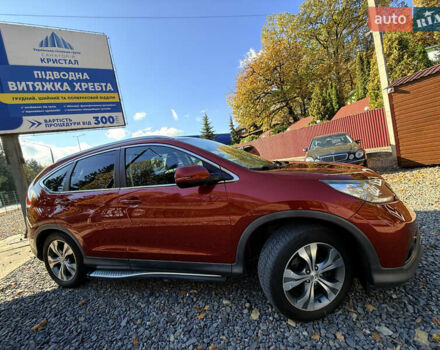 Хонда СРВ 2013 в Трускавце на Automoto.ua Красный Хонда СРВ, объемом двигателя 2.2 л и пробегом 293 тыс. км за 16599 $, фото 2 на Automoto.ua