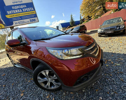 Хонда СРВ 2013 в Трускавце на Automoto.ua Красный Хонда СРВ, объемом двигателя 2.2 л и пробегом 293 тыс. км за 16599 $, фото 4 на Automoto.ua