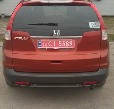 Красный Хонда СРВ, объемом двигателя 2.2 л и пробегом 209 тыс. км за 16950 $, фото 1 на Automoto.ua