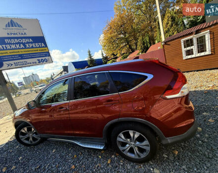 Хонда СРВ 2013 в Трускавце на Automoto.ua Красный Хонда СРВ, объемом двигателя 2.2 л и пробегом 293 тыс. км за 16599 $, фото 75 на Automoto.ua