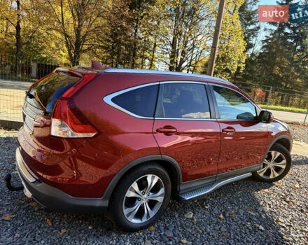 Хонда СРВ 2013 в Трускавце на Automoto.ua Красный Хонда СРВ, объемом двигателя 2.2 л и пробегом 293 тыс. км за 16599 $, фото 14 на Automoto.ua