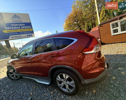 Хонда СРВ 2013 в Трускавце на Automoto.ua Красный Хонда СРВ, объемом двигателя 2.2 л и пробегом 293 тыс. км за 16599 $, фото 23 на Automoto.ua