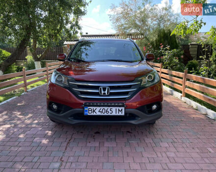 Красный Хонда СРВ, объемом двигателя 2.2 л и пробегом 245 тыс. км за 16950 $, фото 1 на Automoto.ua