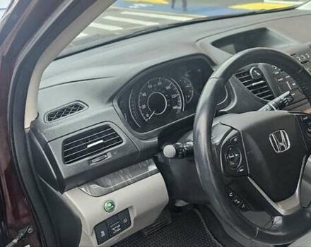 Красный Хонда СРВ, объемом двигателя 2.36 л и пробегом 158 тыс. км за 15600 $, фото 4 на Automoto.ua