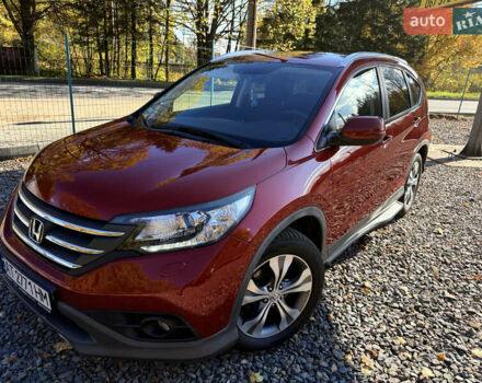 Хонда СРВ 2013 в Трускавце на Automoto.ua Красный Хонда СРВ, объемом двигателя 2.2 л и пробегом 293 тыс. км за 16599 $, фото 9 на Automoto.ua
