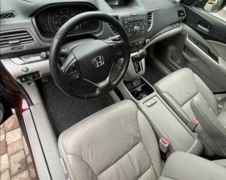 Красный Хонда СРВ, объемом двигателя 2 л и пробегом 228 тыс. км за 16500 $, фото 2 на Automoto.ua