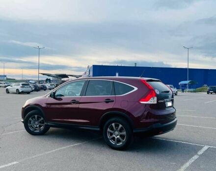 Червоний Хонда СРВ, об'ємом двигуна 2.4 л та пробігом 176 тис. км за 15000 $, фото 3 на Automoto.ua