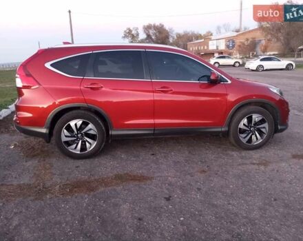 Красный Хонда СРВ, объемом двигателя 1.6 л и пробегом 198 тыс. км за 20500 $, фото 6 на Automoto.ua